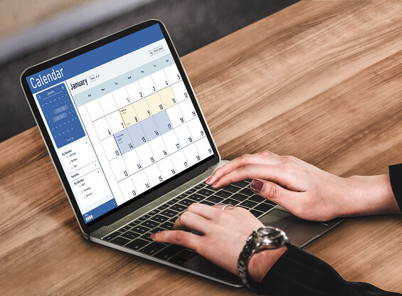 Person using a tablet to manage schedules
