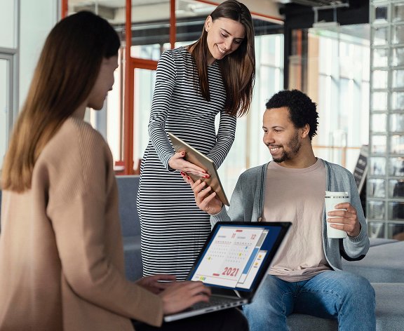 A collaborative team working on a SaaS dashboard